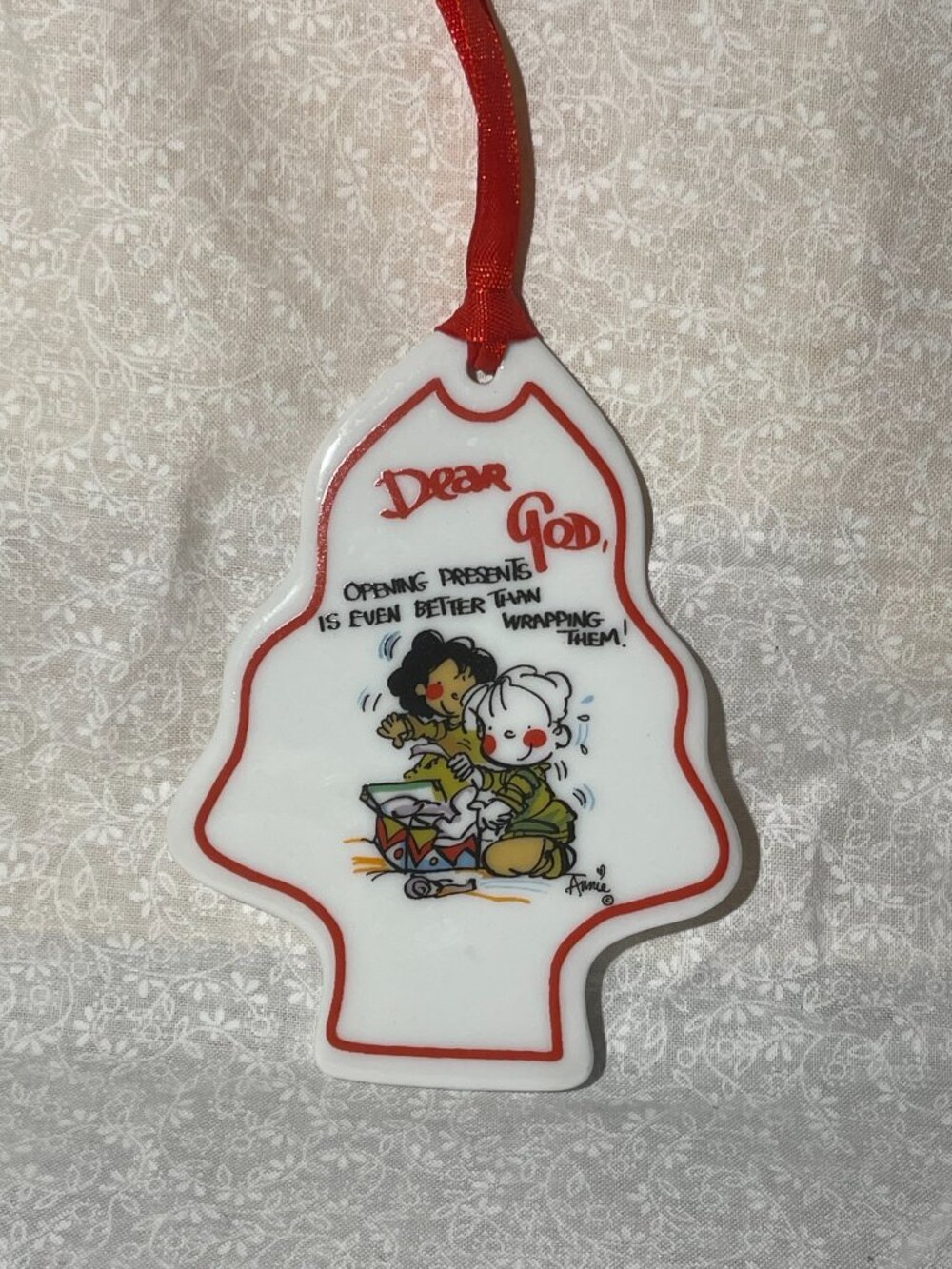 Dear GOD heart shaped Christmas ornament. "Opening Presents" (140)